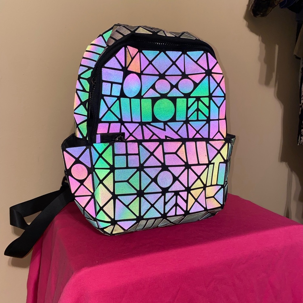 Geometric Holographic Backpack